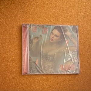 Taylor Swift Life of A ShowGirl CD with Orange Glittery Box